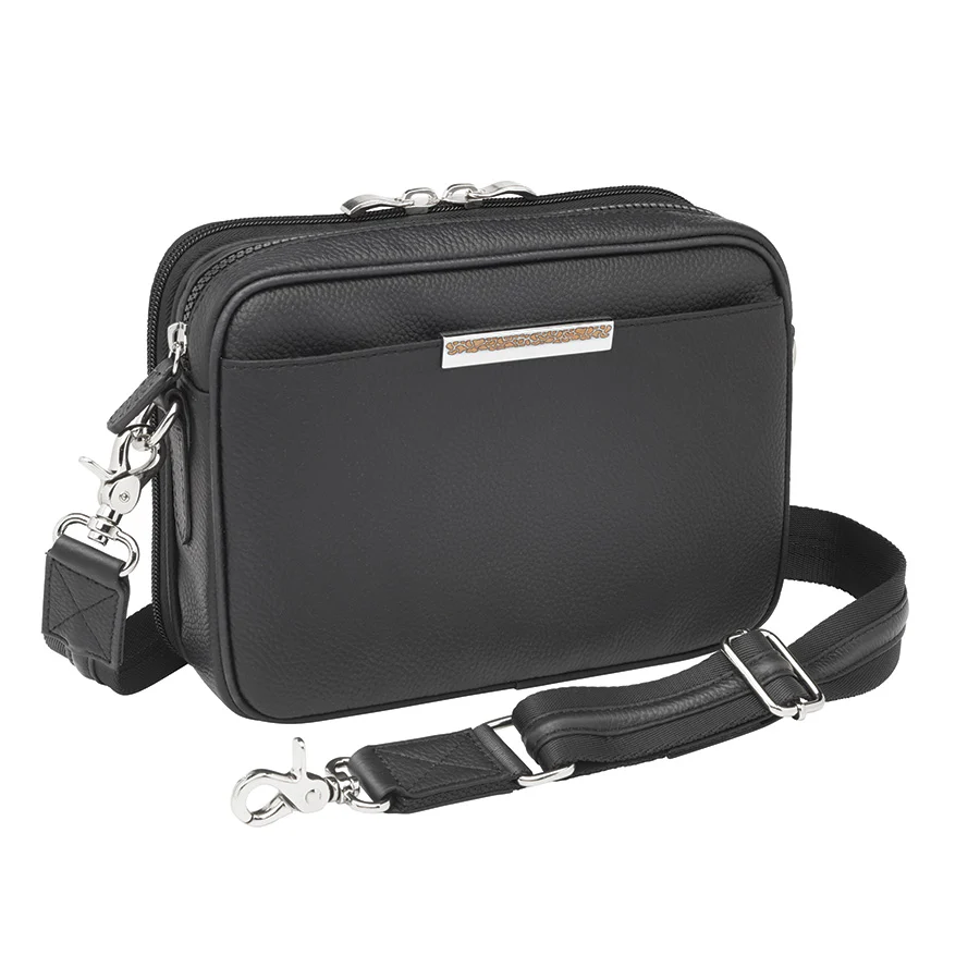 woman wearing slim cowhide concealed carry clutch crossbody bag in black