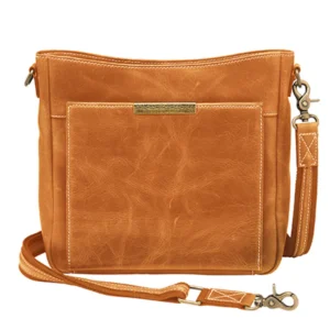woman wearing distressed leather concealed carry crossbody purse with slim organized design