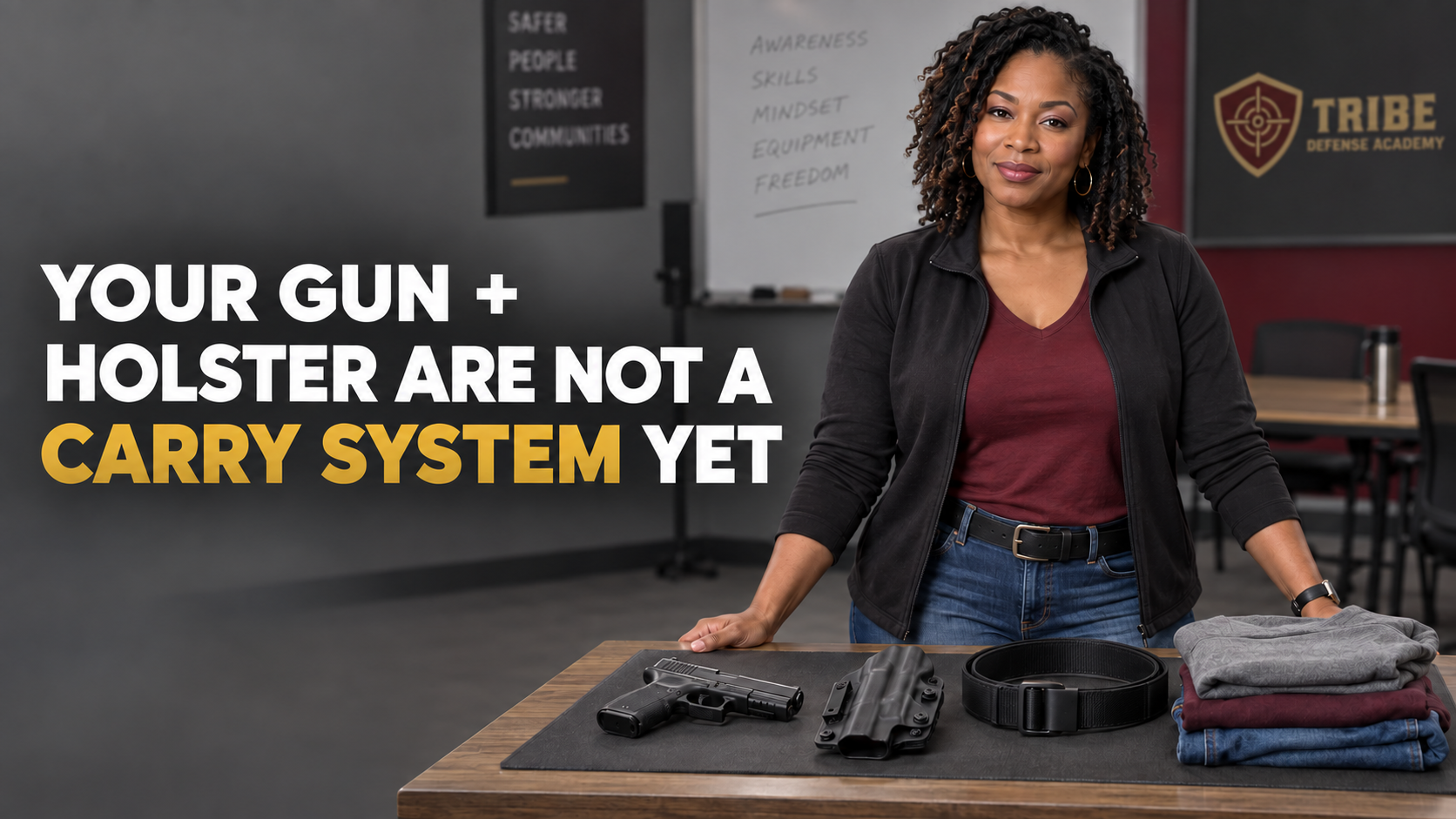 Woman standing behind a table displaying a handgun, holsters and carry accessories